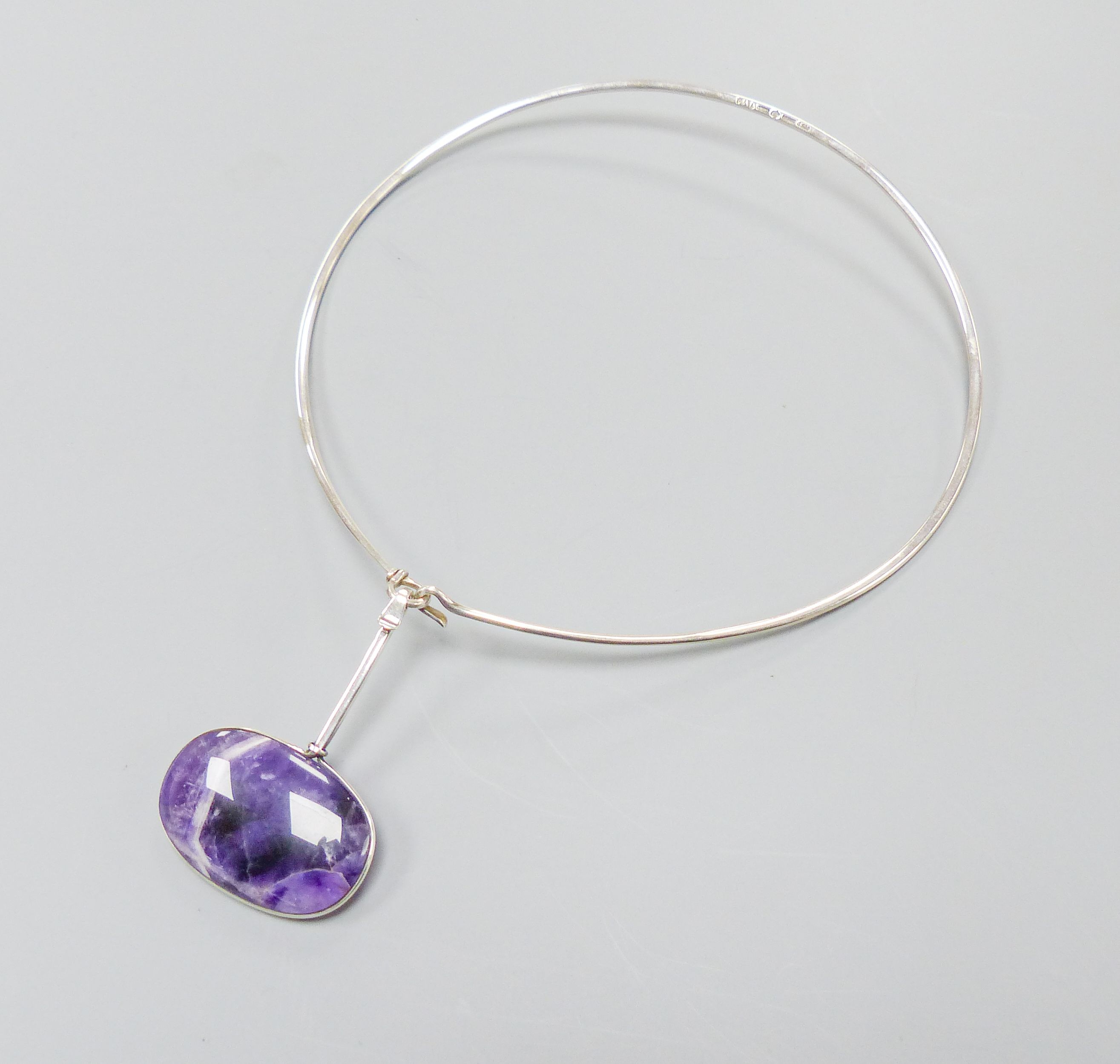 A Torun for Georg Jensen sterling and amethyst quartz set pendant, no. 133, 64mm, on a Torun for Georg Jensen sterling necklet, no. 174.